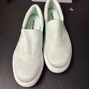 Light green slip-on canvas shoes.  Size 10